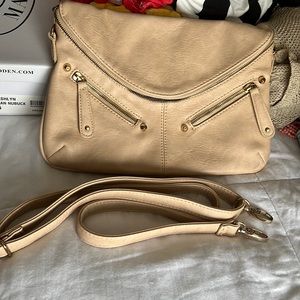 Like new street level tan/nude faux leather clutch with removable strap